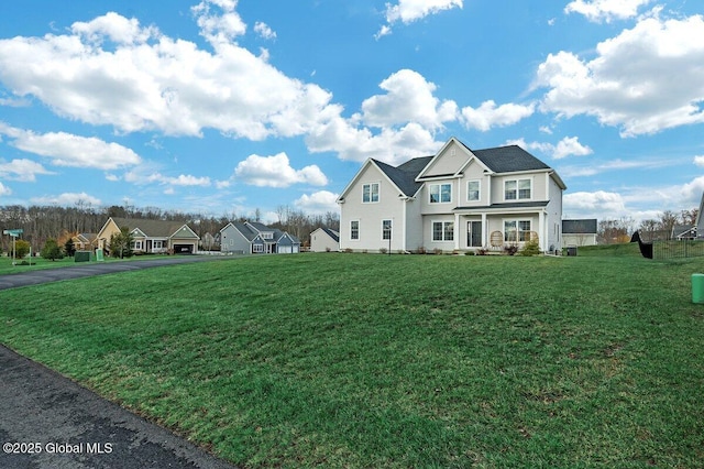 view of front of property with a front lawn