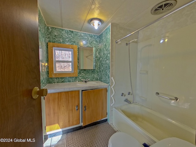 full bathroom with vanity,  shower combination, and toilet