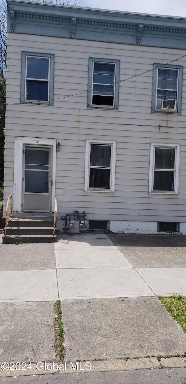 view of front of home with a patio area