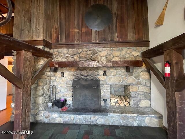 details with a stone fireplace