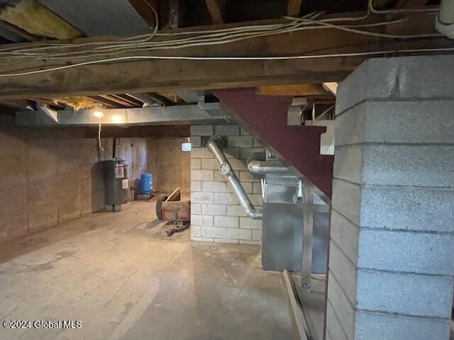 basement featuring water heater