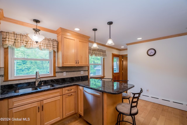 kitchen with dishwasher, sink, tasteful backsplash, light hardwood / wood-style flooring, and decorative light fixtures