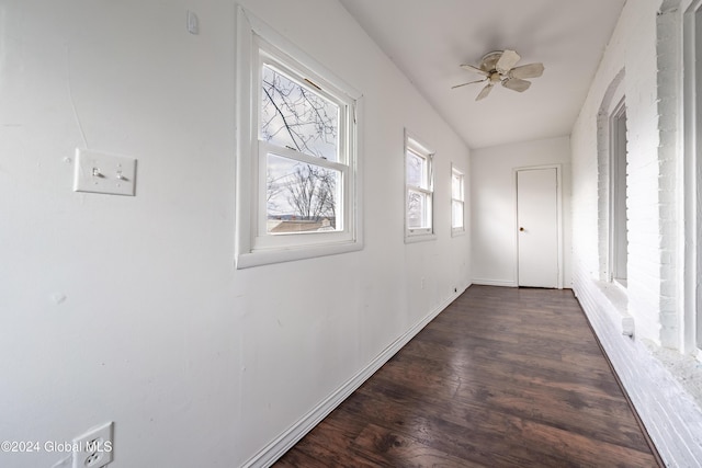 hall with dark hardwood / wood-style floors