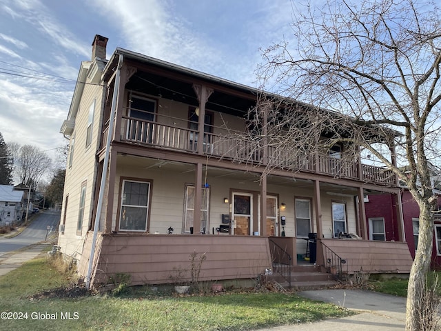 187-189 Canal St, Fort Plain, NY 13339 - view of front of property featuring a porch and a balcony