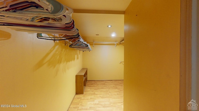 walk in closet featuring light wood-type flooring