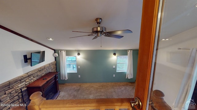 living room with ceiling fan, crown molding, and wood-type flooring