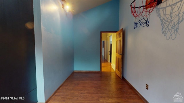 hall with dark hardwood / wood-style floors