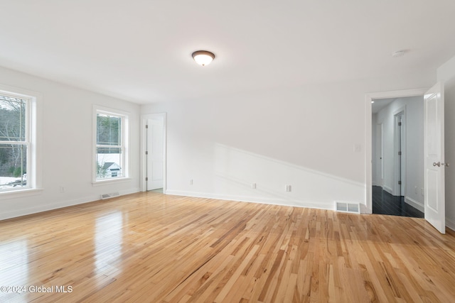 empty room featuring hardwood / wood-style flooring