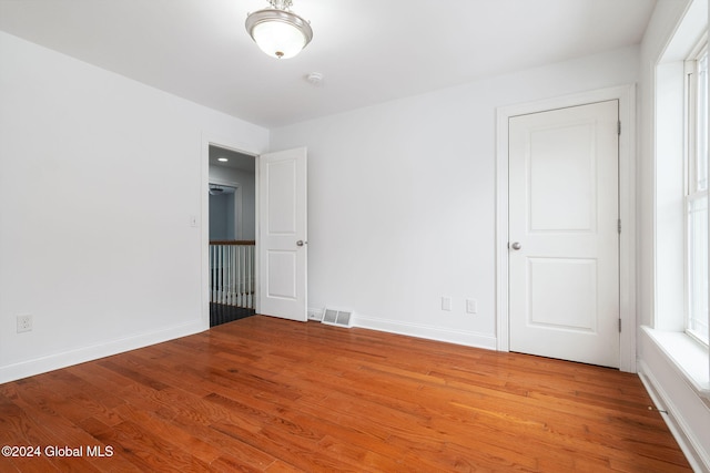 unfurnished room featuring light wood-type flooring