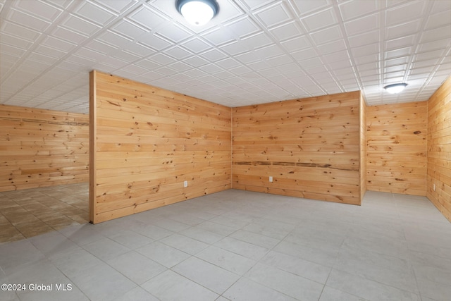 empty room with wood walls