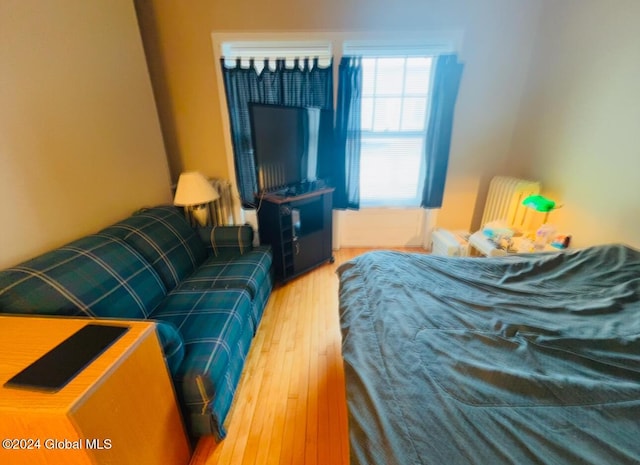 bedroom featuring hardwood / wood-style floors