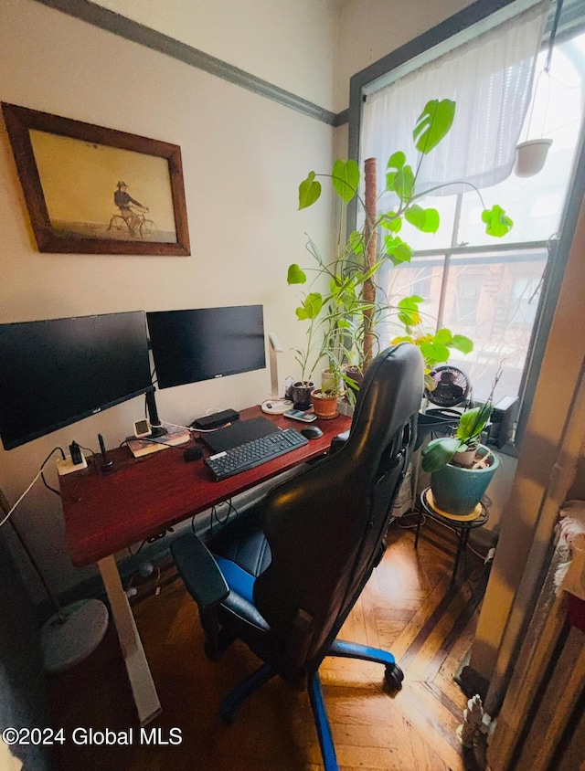 home office with parquet flooring