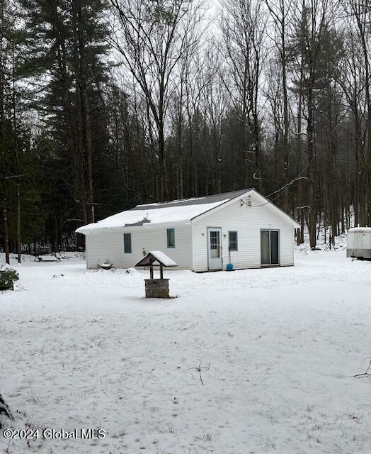 view of snow covered property