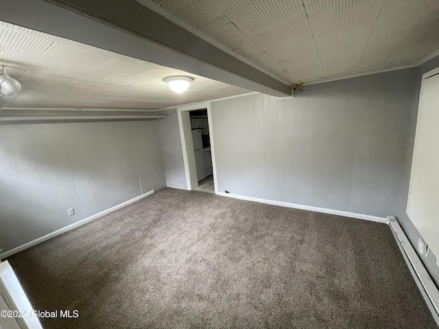 basement featuring carpet and baseboard heating