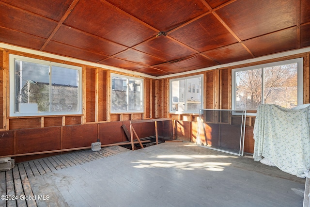 miscellaneous room featuring hardwood / wood-style flooring, a healthy amount of sunlight, and wood ceiling