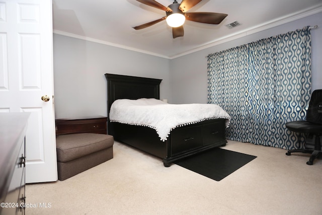 bedroom with carpet, ceiling fan, and ornamental molding