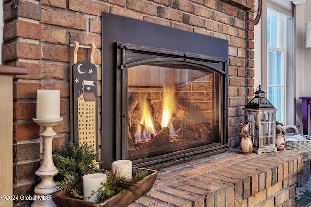 details with a brick fireplace