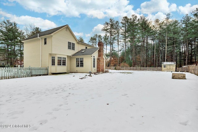 view of snow covered property