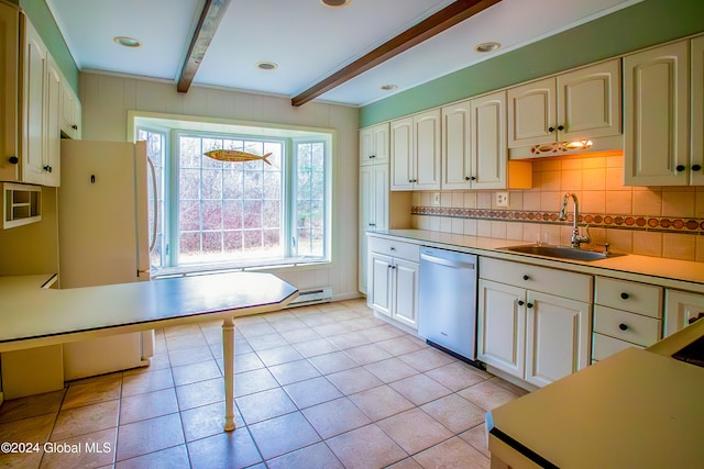 kitchen featuring dishwasher, sink, light tile patterned floors, beam ceiling, and white fridge