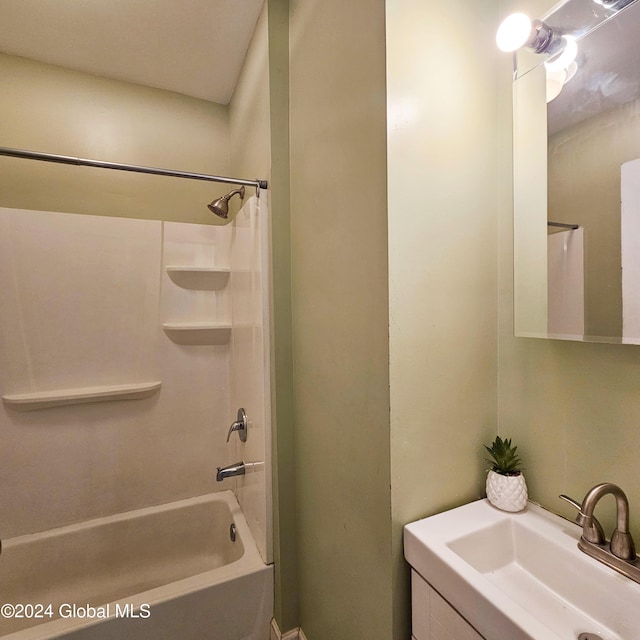 bathroom featuring vanity and shower / bathing tub combination