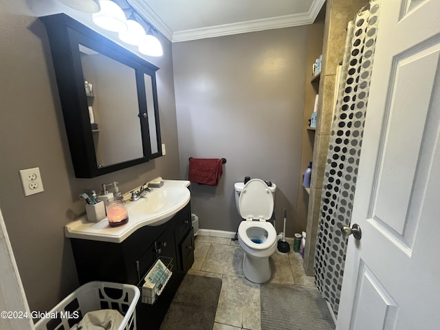 bathroom featuring toilet, tile patterned flooring, vanity, and ornamental molding