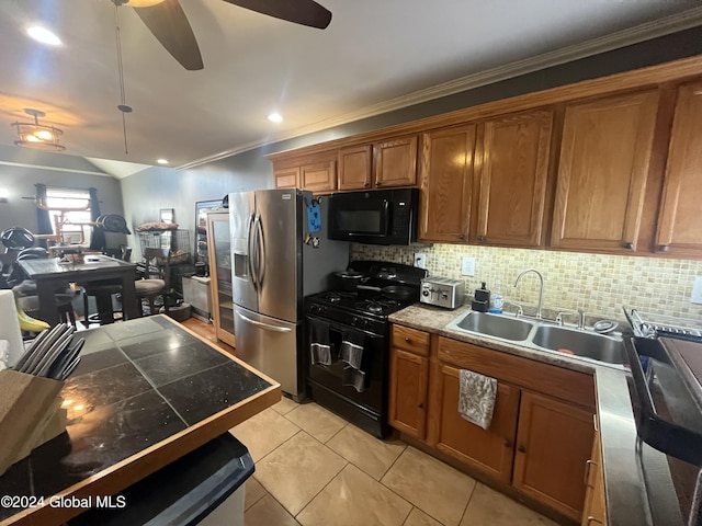 kitchen with ceiling fan, crown molding, sink, black appliances, and light tile patterned flooring