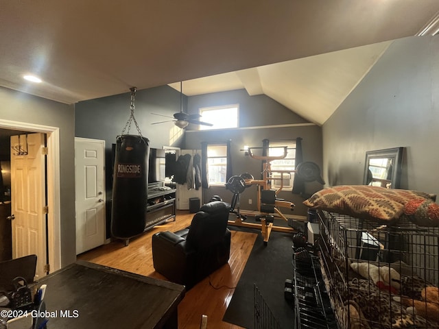 interior space with light hardwood / wood-style floors, ceiling fan, and lofted ceiling