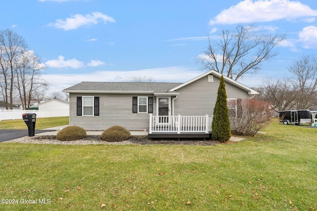 single story home featuring a front yard