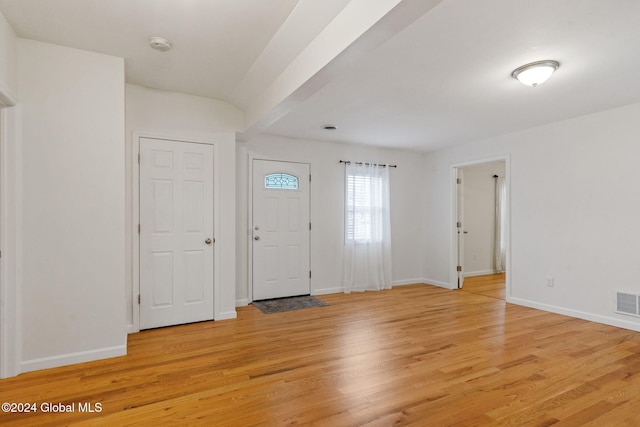 foyer entrance with light wood-type flooring