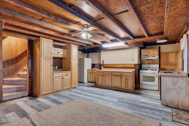 kitchen with ceiling fan, sink, beamed ceiling, light hardwood / wood-style floors, and white appliances