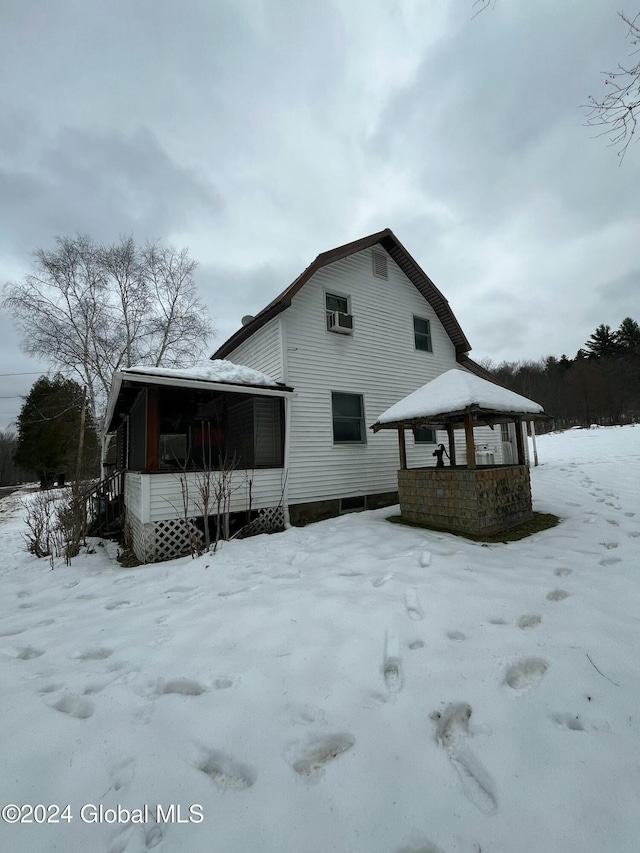 view of snow covered property