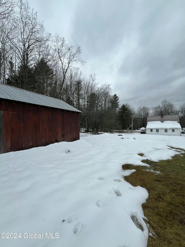 view of snowy yard