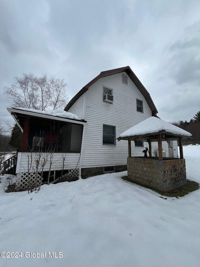 view of snow covered property