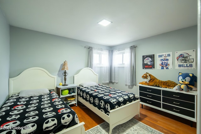 bedroom featuring hardwood / wood-style floors