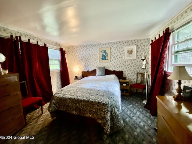 bedroom with dark carpet