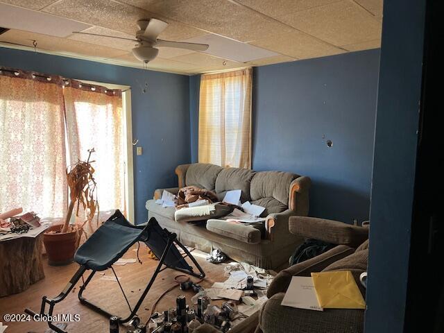 misc room featuring ceiling fan and wood-type flooring