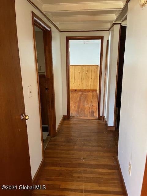 corridor featuring dark hardwood / wood-style floors