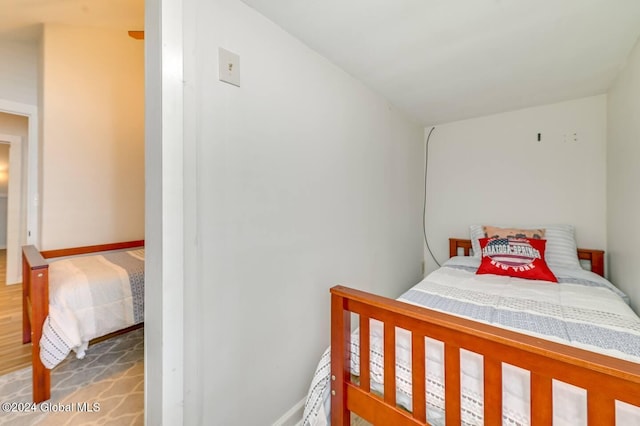 bedroom featuring wood-type flooring