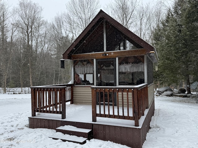 view of snow covered deck