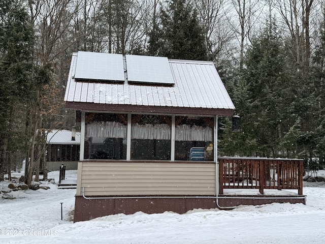 exterior space with solar panels