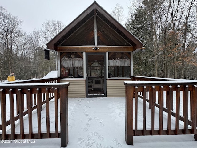 view of snow covered deck