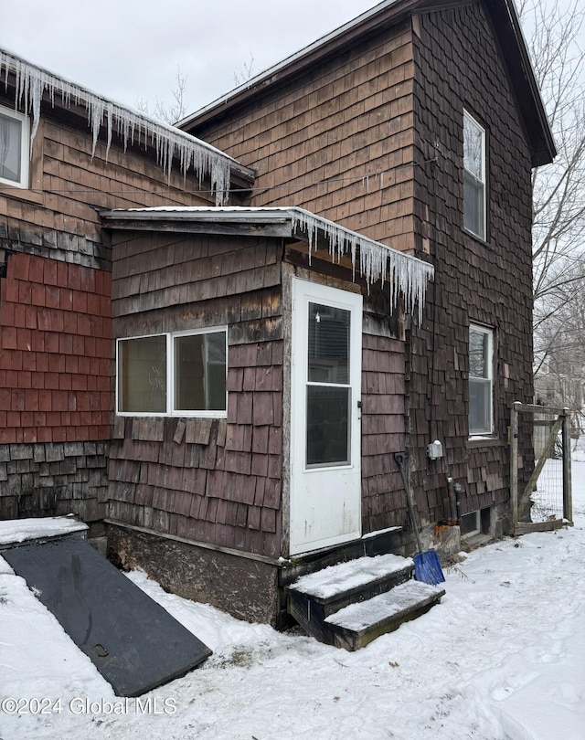 view of snow covered property