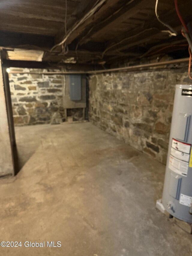 basement featuring water heater