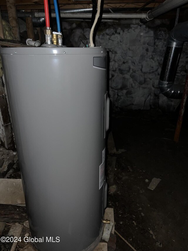 utility room with water heater