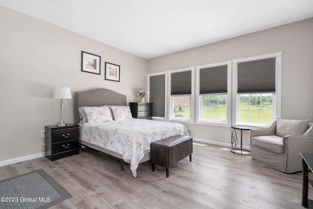 bedroom featuring light wood-type flooring