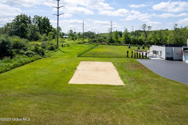 view of home's community featuring a yard