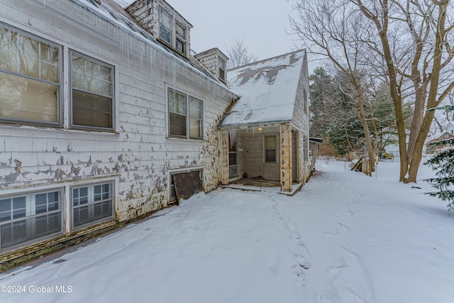 view of snow covered property