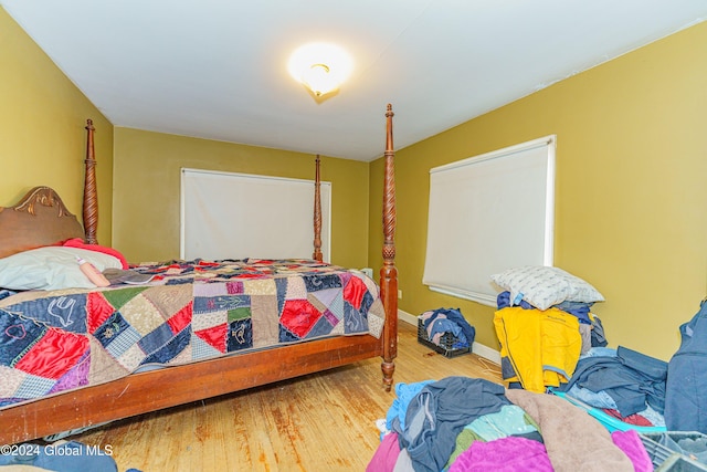 bedroom featuring hardwood / wood-style floors