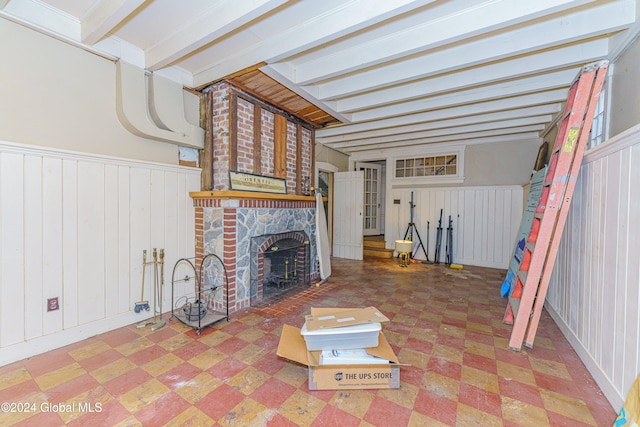 interior space featuring a fireplace and beam ceiling