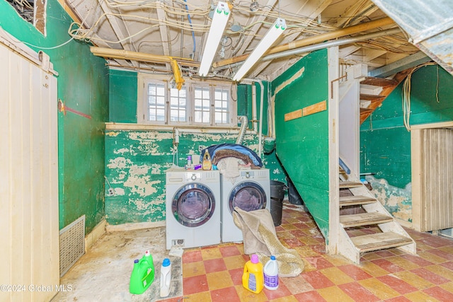 laundry area featuring independent washer and dryer